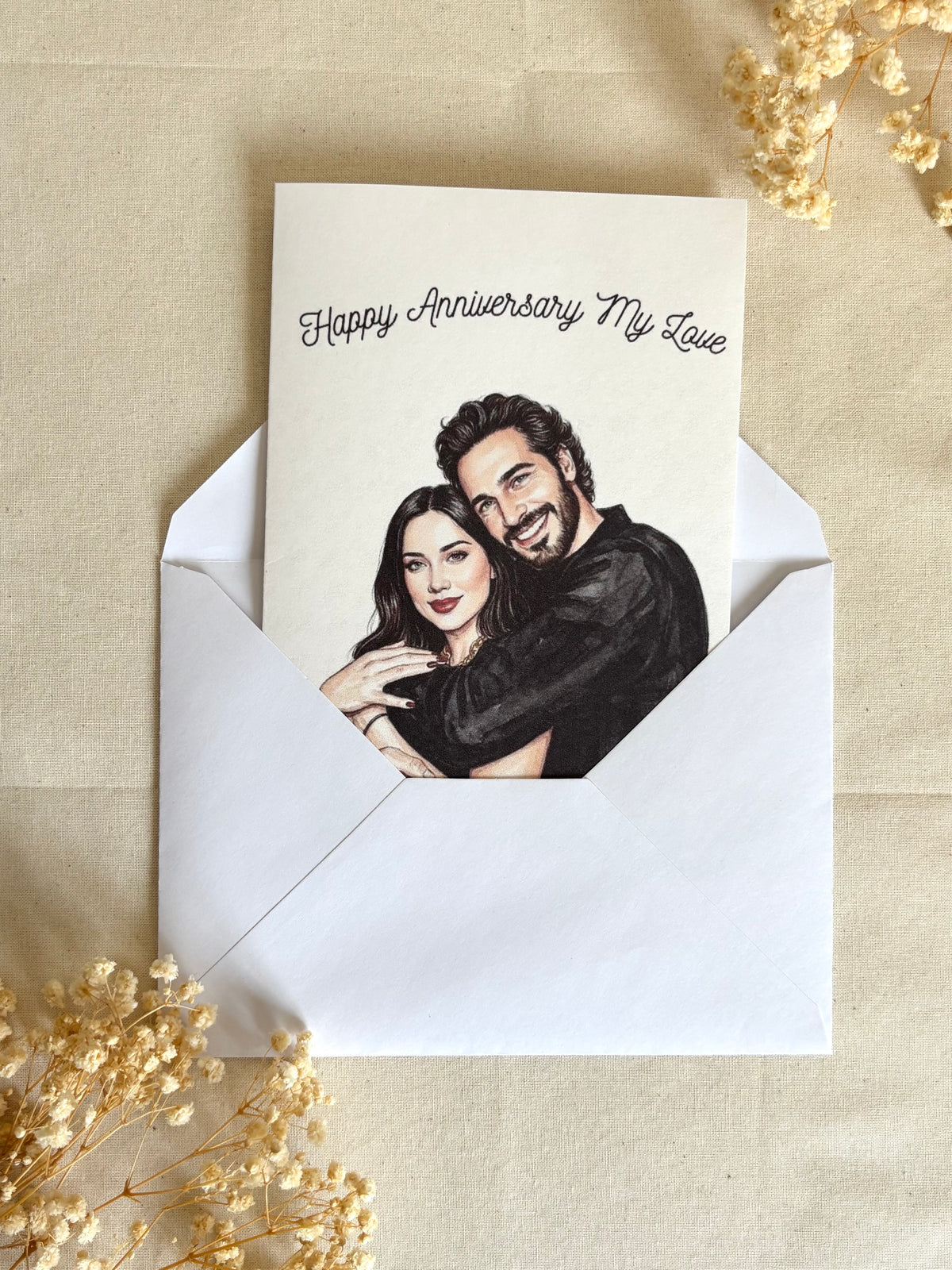 Custom watercolor anniversary card with matching envelope ready for gifting.