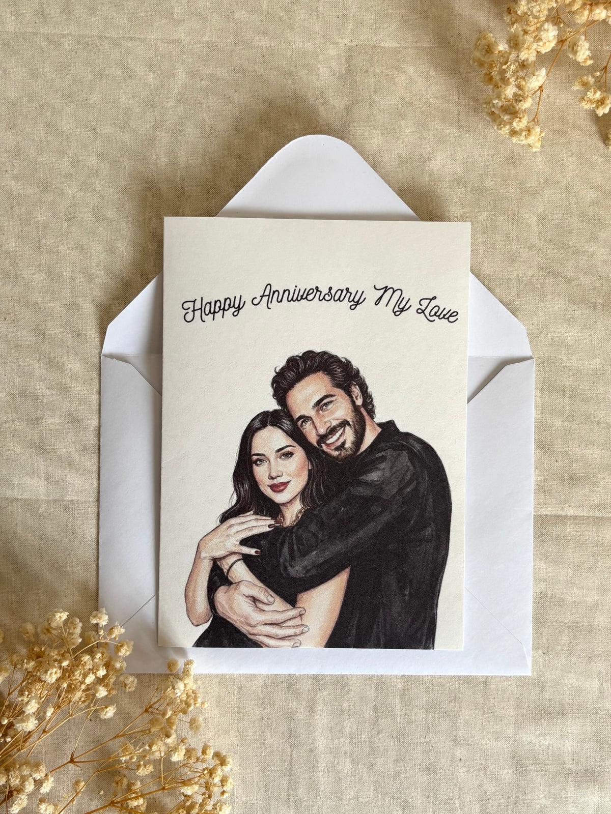 Personalized anniversary greeting card displayed with a white envelope.